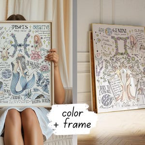 a woman sitting on a bed holding up a picture