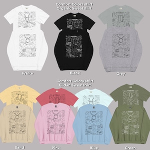 Peut inclure: Plusieurs t-shirts et sweatshirts Comfort Colors de diff&eacute;rentes couleurs, dont blanc, noir, gris, sable, rose, bleu et vert. Chaque v&ecirc;tement pr&eacute;sente un motif graphique d&eacute;taill&eacute; dessin&eacute; &agrave; la main avec des symboles du zodiaque et du texte.