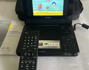 Sony DVP-FX750 7" Portable DVD Player Case Remote Manual Cords Tested Works