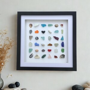 Colourful sea glass grid art, large coastal beach finds wall decor, statement ocean theme artwork, black framed 3D shell flat lay picture
