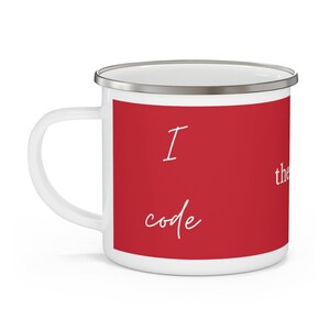 May include: White enamel mug with a silver rim and handle. The mug features a red panel with the words "I code" in a white, cursive font. The mug is designed for hot beverages.