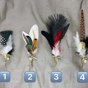 boutonnière feather for hat!  Please enter your initial in the personalization field and we'll add your initial and embody word to feather.