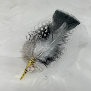 piuma da boutonnière per cappello!