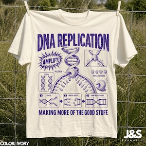 May include: An ivory t-shirt featuring a purple graphic print detailing DNA replication. The design includes the text DNA REPLICATION and MAKING MORE OF THE GOOD STUFF, along with diagrams labeled AMPLIFY, COPY, HELICASE, and NUCLEOTIDES.