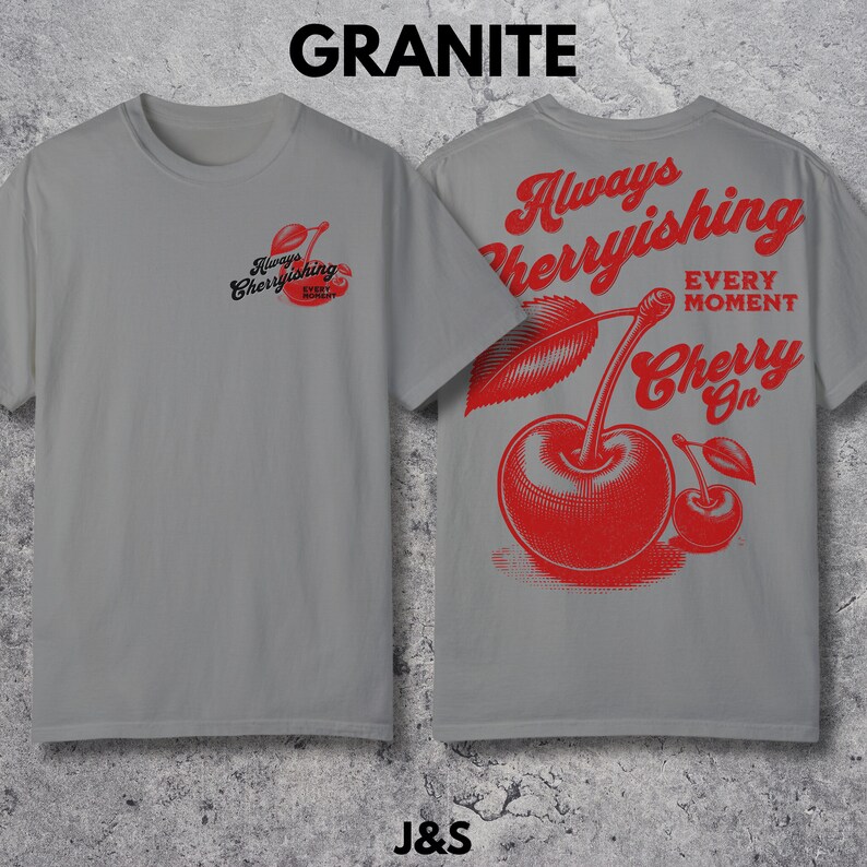 May include: A gray t-shirt with a red cherry graphic on the front and back. The front graphic says "Always Cherryishing Every Moment". The back graphic says "Always Cherryishing Every Moment Cherry On".