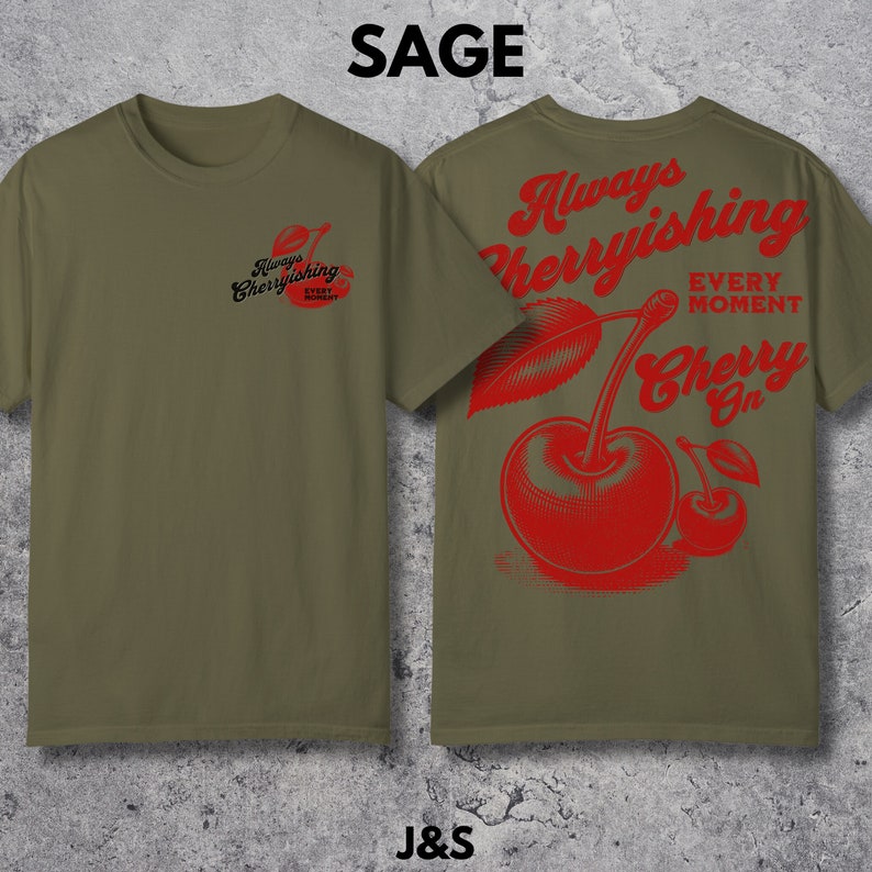 May include: Sage green t-shirt with a red cherry graphic and the text "Always Cherryishing Every Moment Cherry On".