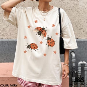 Vintage 90s Ladybug Shirt, Retro Star Graphic Tee, Ladybird Aesthetic Top, Comfort Colors® Nature Lover Gift, Artistic Y2K Cottagecore Bug Ivory