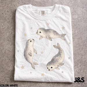 Maglietta vintage con cucciolo di foca, maglietta grafica retrò con stella, top estetico con cucciolo di foca, regalo Comfort Colors® per gli amanti degli animali marini, stile artistico Y2K