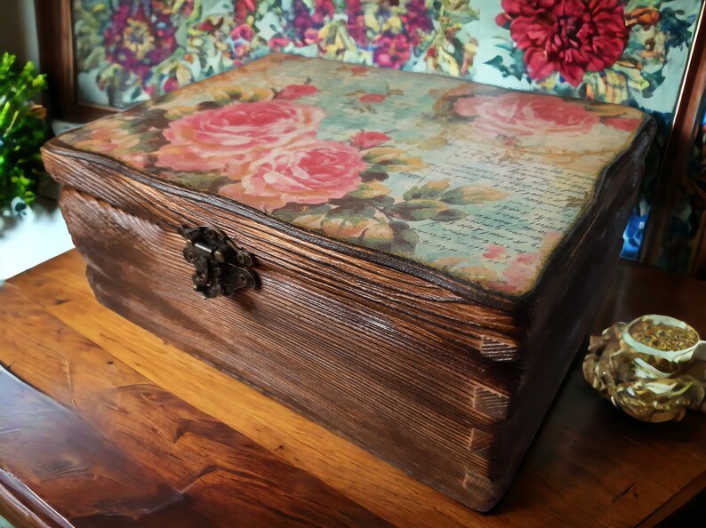 Old wooden box with flower