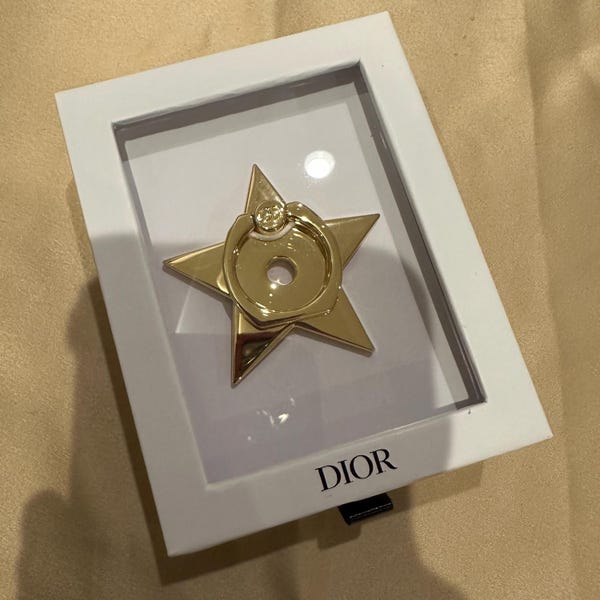 Authentic Dior beaute star phone ring holder in silver 2000s