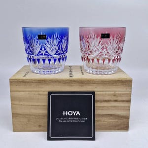 A pair of stunning rare vintage Hoya hand-cut crystal tumbler/whiskey glass, blue and pink, NOS with brand sticker, card and wooden box.