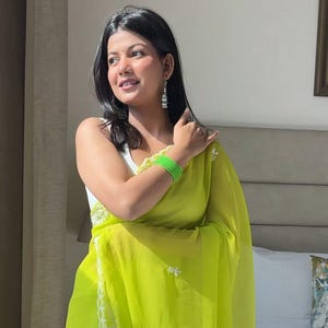 Parrot Green Georgette Saree: Bollywood Embroidery Cutwork Border