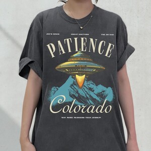 Patience, Colorado Graphic T-Shirt, Alien UFO TV Show Memorabilia Tee, Funny Retro Travel Poster Shirt for Resident of Patience, CO