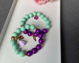 Armband mit miracle beads und Smiley mint lila