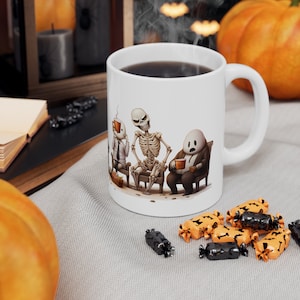 Brew up some ghostly delight with our Ceramic Ghosts & Coffee Mug