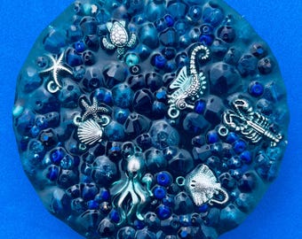 Remeltable under the sea pick pad