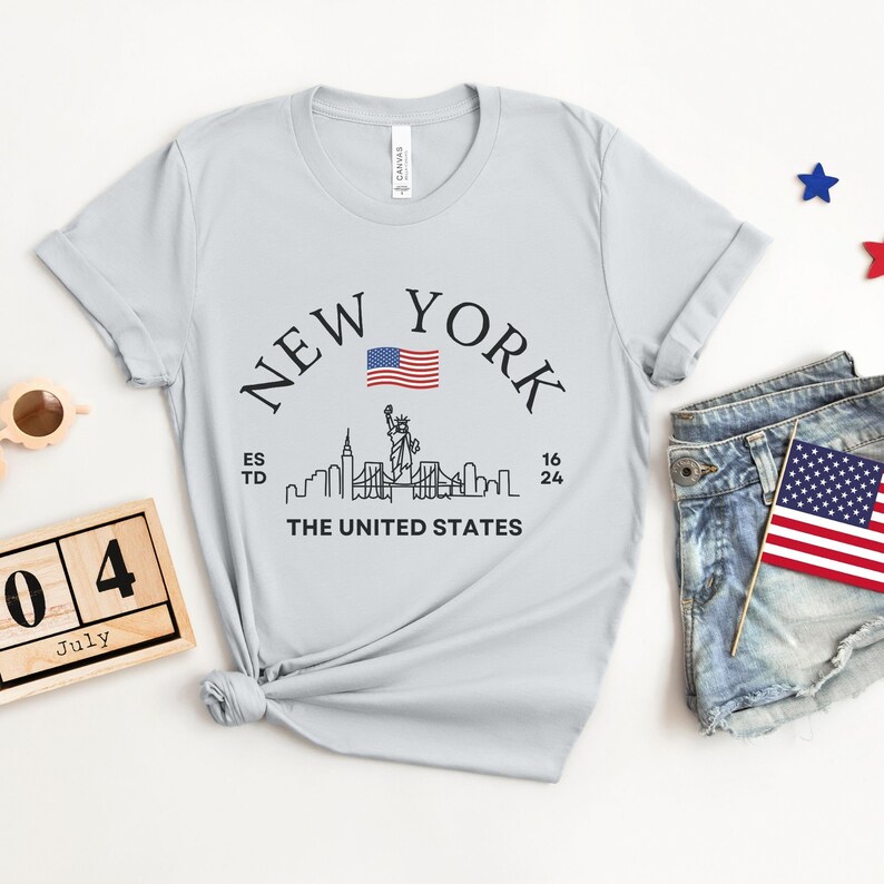 New York Skyline T-Shirt, US Flag Shirt, NYC Skyline Tee, Patriotic NYC Shirt, American Flag Apparel, NYC Skyline Graphic Tee, Statue of Liberty Shirt, NYC Landscape Shirt, Empire State Shirt, NYC Flag Tee, New York City Graphic Tee,