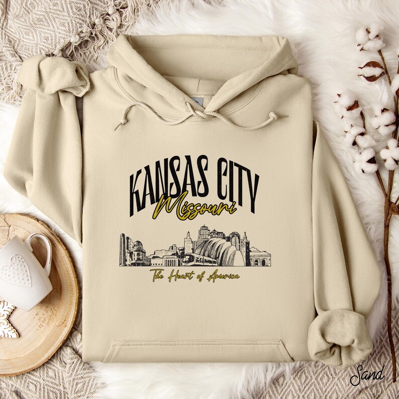 Retro oversized Kansas City skyline Hoodie with vintage cityscape design. Unisex hooded sweatshirt perfect for Kansas City fans and Missouri State lovers. Unique varsity-style Kansas City fan shirt with bold city skyline graphic.