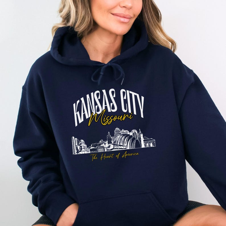 Retro oversized Kansas City skyline Hoodie with vintage cityscape design. Unisex hooded sweatshirt perfect for Kansas City fans and Missouri State lovers. Unique varsity-style Kansas City fan shirt with bold city skyline graphic.