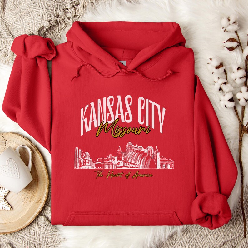 Retro oversized Kansas City skyline Hoodie with vintage cityscape design. Unisex hooded sweatshirt perfect for Kansas City fans and Missouri State lovers. Unique varsity-style Kansas City fan shirt with bold city skyline graphic.