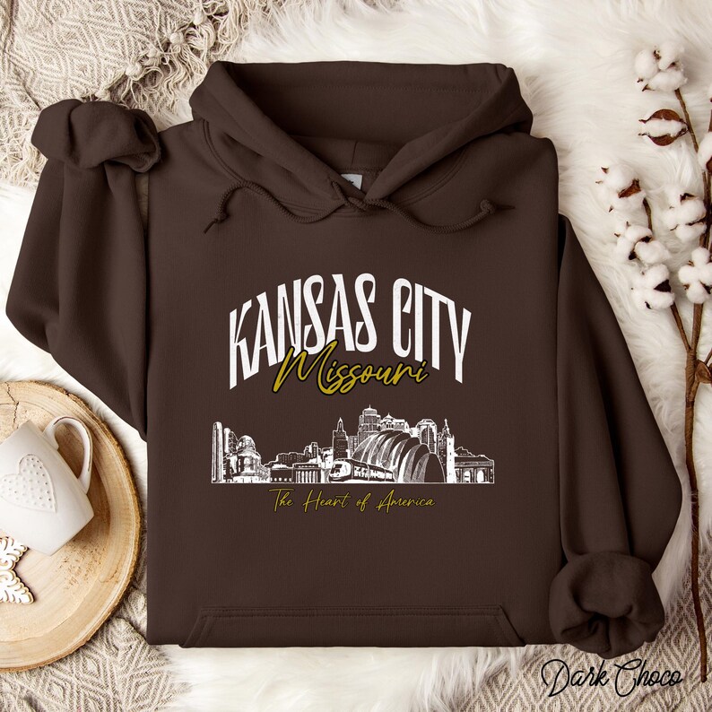 Retro oversized Kansas City skyline Hoodie with vintage cityscape design. Unisex hooded sweatshirt perfect for Kansas City fans and Missouri State lovers. Unique varsity-style Kansas City fan shirt with bold city skyline graphic.