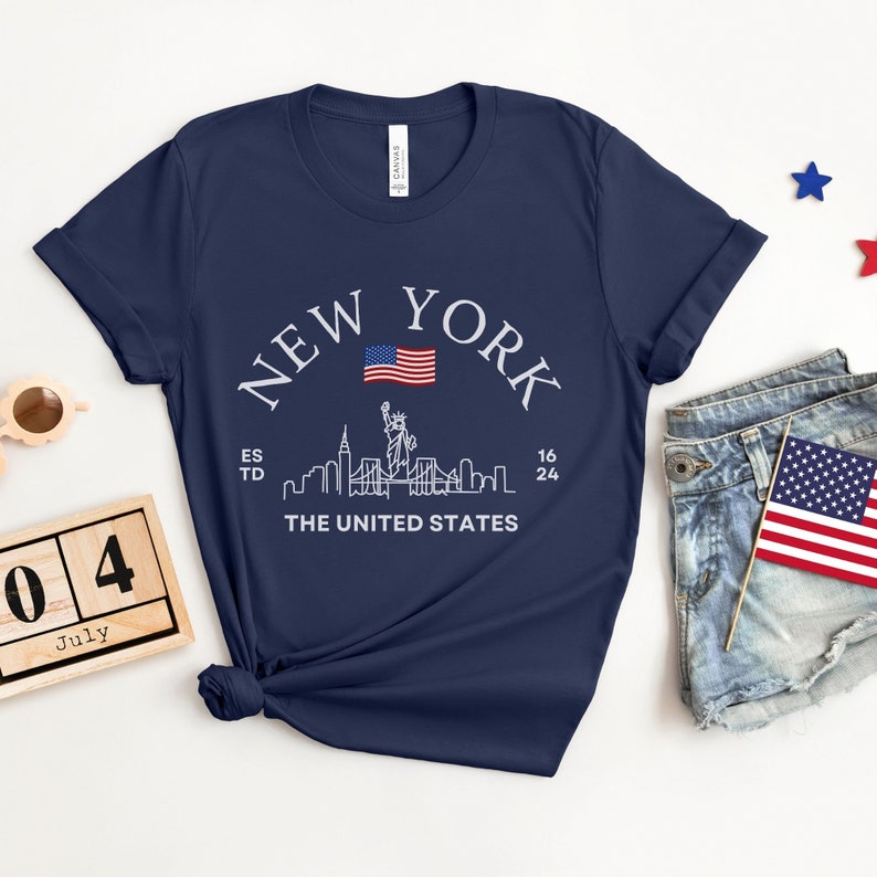 New York Skyline T-Shirt, US Flag Shirt, NYC Skyline Tee, Patriotic NYC Shirt, American Flag Apparel, NYC Skyline Graphic Tee, Statue of Liberty Shirt, NYC Landscape Shirt, Empire State Shirt, NYC Flag Tee, New York City Graphic Tee,