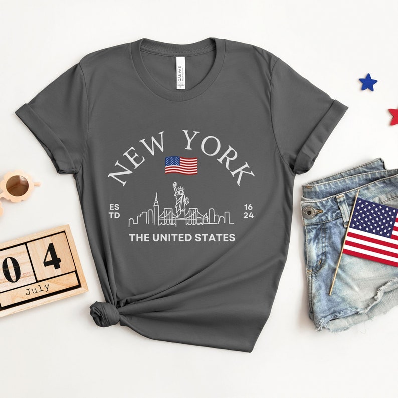 New York Skyline T-Shirt, US Flag Shirt, NYC Skyline Tee, Patriotic NYC Shirt, American Flag Apparel, NYC Skyline Graphic Tee, Statue of Liberty Shirt, NYC Landscape Shirt, Empire State Shirt, NYC Flag Tee, New York City Graphic Tee,