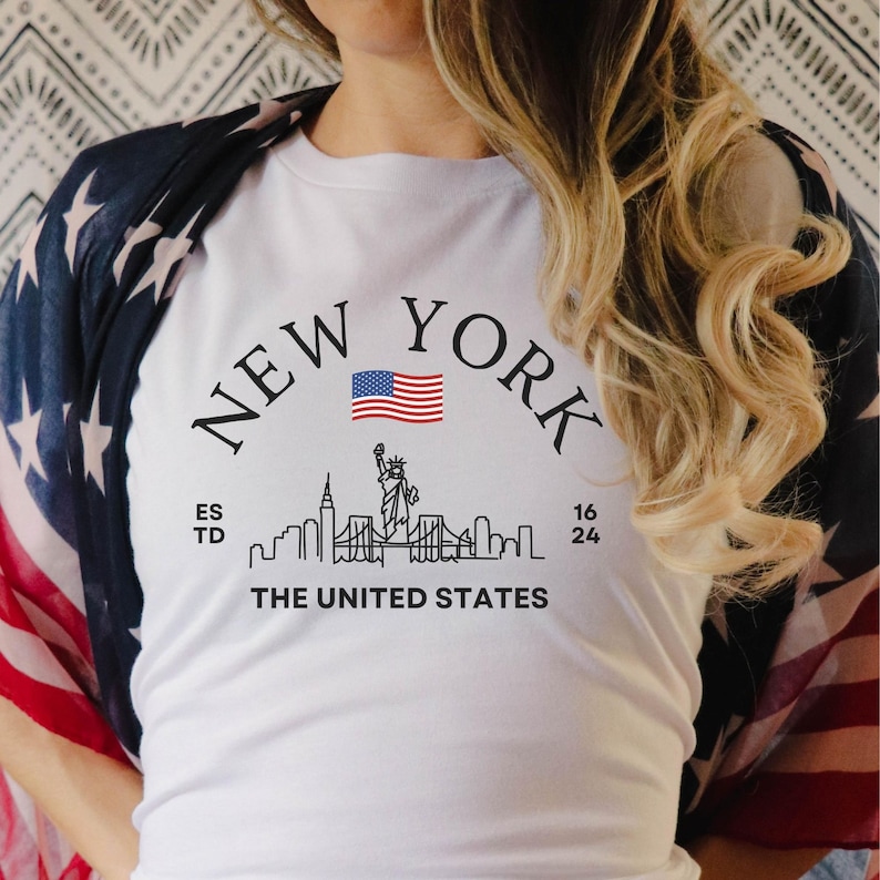 New York Skyline T-Shirt, US Flag Shirt, NYC Skyline Tee, Patriotic NYC Shirt, American Flag Apparel, NYC Skyline Graphic Tee, Statue of Liberty Shirt, NYC Landscape Shirt, Empire State Shirt, NYC Flag Tee, New York City Graphic Tee,