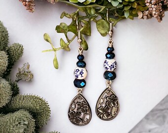 Gunmetal gray charm earrings with blue glass and floral beading