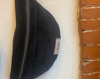 Schwarze Gürteltasche aus Cord