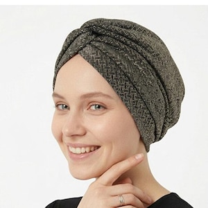 May include: A set of three ceramic mugs with a speckled, matte finish. Each mug features a different color: light blue, cream, and gray. The mugs have a simple, modern design and a comfortable handle.