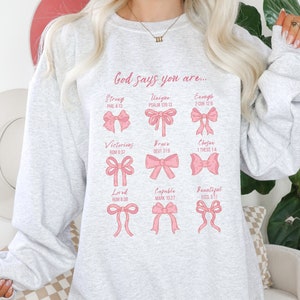 God Says You Are Christian Crewneck Spiritual Sweatshirt Womens Pink Bow Sweatshirt Coquette Aesthetic Coquette Clothes Scripture Shirt