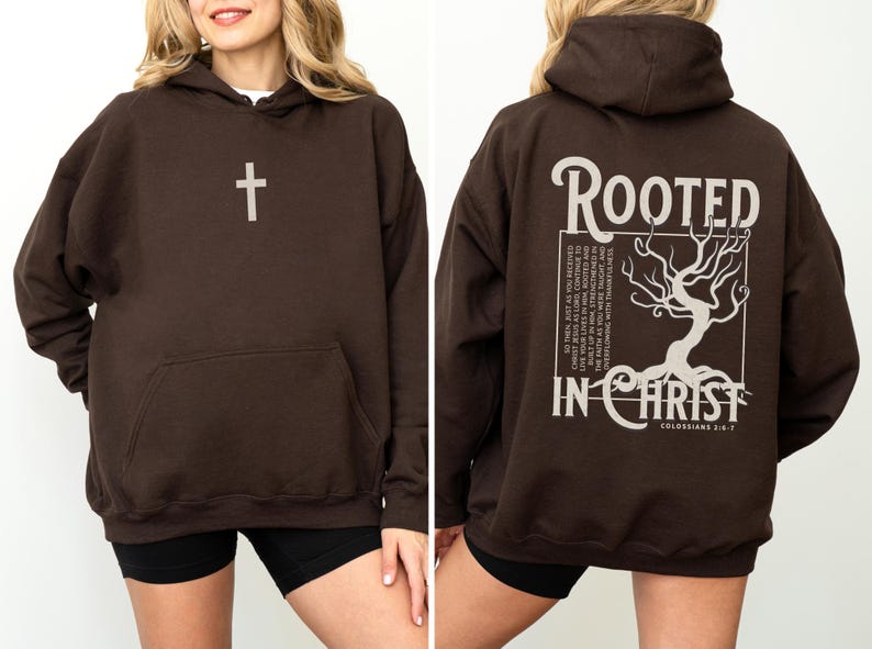 May include: A brown hoodie with a cross on the front and the text "Rooted in Christ" and a tree graphic on the back. The text also includes "Colossians 2:6-7".