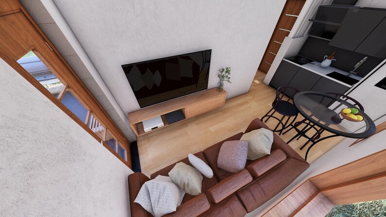 May include: An overhead view of a modern living room with a brown leather sofa, a large black television, and a small dining area. The room has light-colored walls and wooden accents, creating a contemporary aesthetic.