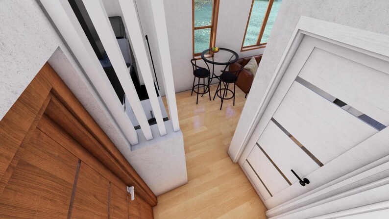 May include: Interior view of a modern home with a wooden door, white walls, and a small dining area. The dining area features a round table and two black bar stools. A white door with horizontal glass panels is visible.