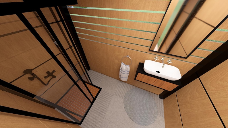 Pu&ograve; includere: Vista interna di un bagno moderno con pannelli in legno e un box doccia in vetro. Presenta un lavabo bianco con rubinetti cromati, uno specchio e un asciugamano a righe. Il pavimento ha un tappeto rotondo.