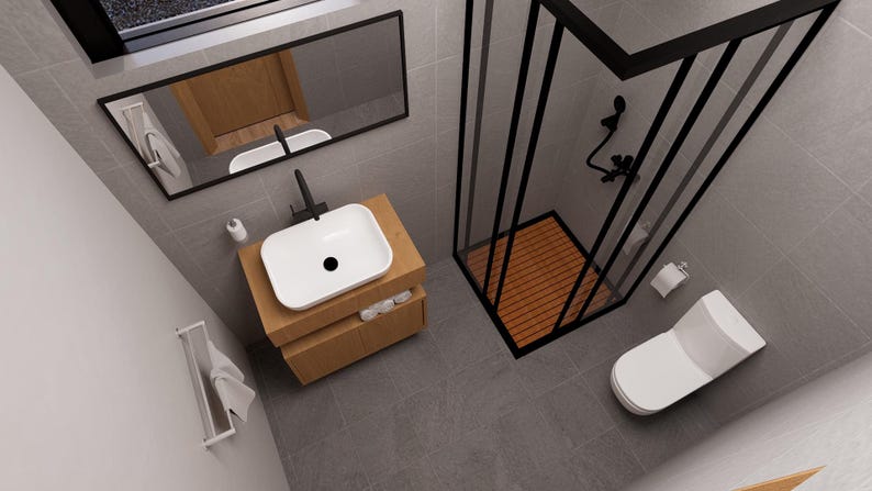 May include: Modern bathroom design featuring a white rectangular sink with a black faucet, set on a wooden cabinet. A black-framed shower enclosure with a wooden floor is adjacent to a white toilet. The room has gray tiled floors and walls.