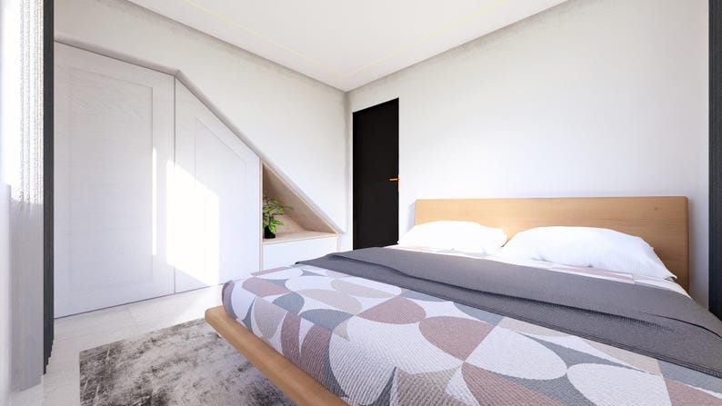 May include: A modern bedroom interior featuring a wooden bed frame with a patterned comforter and gray blanket. White pillows rest on the bed. A black door and white built-in cabinets are visible. A small plant sits in a niche.