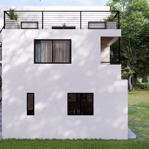 May include: A modern, two-storey white house with black accents. The house features a rooftop deck with a black railing, multiple windows, and a staircase with a black railing. The house is surrounded by green grass and trees.