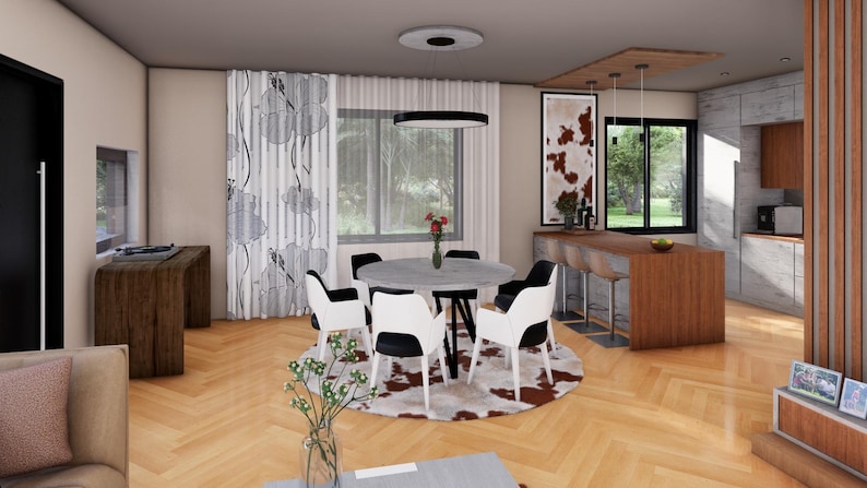 Peut inclure: Une salle &agrave; manger moderne avec une table ronde et six chaises. La table est pos&eacute;e sur un tapis en peau de vache. La pi&egrave;ce dispose de parquet, de grandes fen&ecirc;tres et d'un coin cuisine avec un bar.