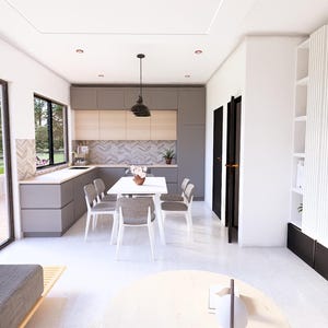 May include: Interior view of a modern living space with a kitchen and dining area. The kitchen features gray cabinets and a light wood backsplash. A white dining table with gray chairs is set in front of the kitchen. The living area has a gray sofa and a round coffee table.