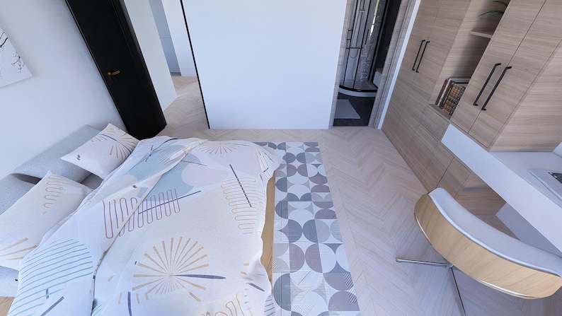 May include: Bedroom interior featuring a bed with a patterned duvet cover and pillows. A geometric rug in grey and white tones is at the foot of the bed. Light wood flooring and a wooden cabinet are also visible.