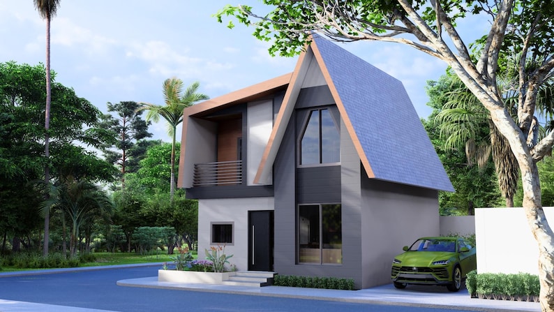 Peut inclure: Une maison moderne &agrave; deux &eacute;tages avec un ext&eacute;rieur gris, un toit bleu et un accent marron. La maison a de grandes fen&ecirc;tres et un petit balcon. Une voiture verte est gar&eacute;e devant la maison, et une verdure luxuriante entoure la propri&eacute;t&eacute;.