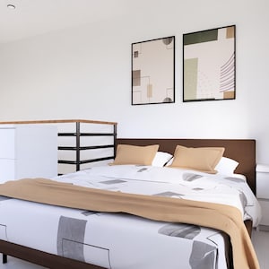 May include: A contemporary bedroom scene featuring a bed, bedside table, and artwork. The bed has a brown headboard, beige pillows, and a patterned duvet cover. A tan throw is draped across the bed. Two framed abstract art pieces are on the wall.