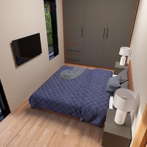 May include: Bedroom interior with a blue patterned bedspread, gray pillows, and a gray blanket. The room has a large window, a wall-mounted TV, and two bedside lamps. A large closet is visible.