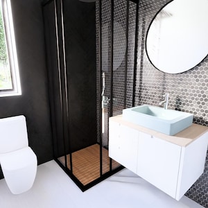 May include: Contemporary bathroom design featuring a white toilet, a black shower enclosure, and a light blue rectangular sink. The walls are dark with a hexagonal tile pattern. A round mirror is above the sink, and a window is visible.