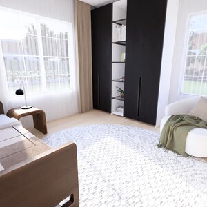 Puede incluir: Interior de dormitorio con una cama, un sill&oacute;n blanco con una manta verde y una alfombra redonda estampada. La habitaci&oacute;n tiene grandes ventanas con cortinas, un armario negro y una mesita de noche de madera con una l&aacute;mpara.