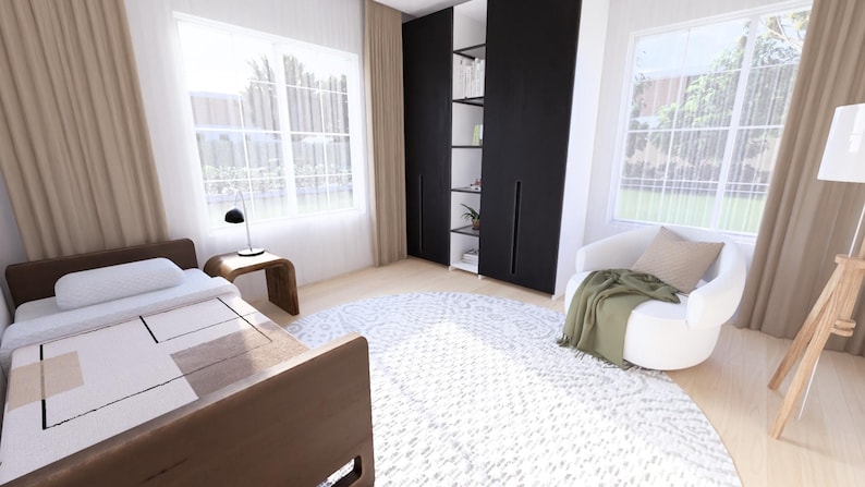 Puede incluir: Interior de dormitorio con una cama, un sill&oacute;n blanco con una manta verde y una alfombra redonda estampada. La habitaci&oacute;n tiene grandes ventanas con cortinas, un armario negro y una mesita de noche de madera con una l&aacute;mpara.