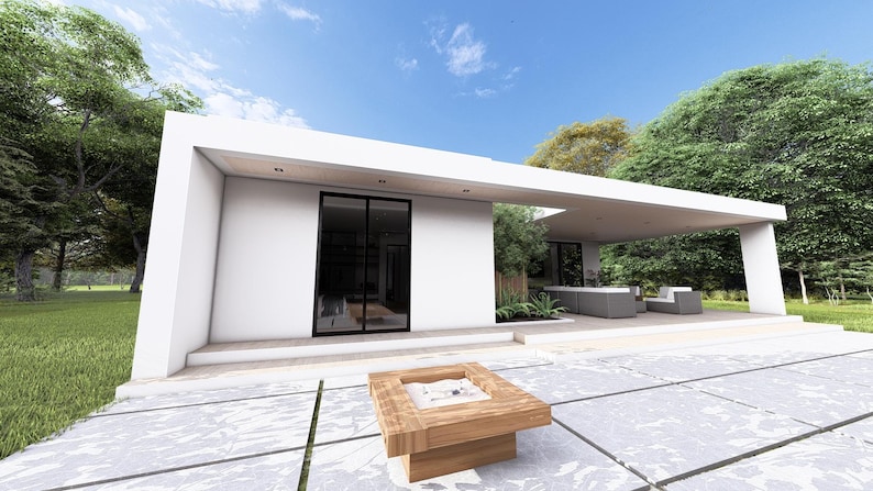 May include: Contemporary white house with a flat roof and large glass doors. The house features a covered patio with outdoor furniture. A wooden fire pit is on a stone patio. Green trees and a blue sky provide a natural backdrop.