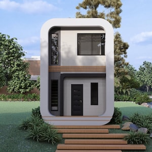 Puede incluir: Una moderna casa de dos pisos con un dise&ntilde;o redondeado &uacute;nico. El exterior presenta un marco blanco, una puerta oscura y un peque&ntilde;o balc&oacute;n. La casa est&aacute; rodeada de hierba verde, &aacute;rboles y una carretera pavimentada.